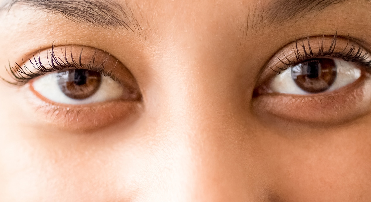 Close up african female face with kind eyes 1