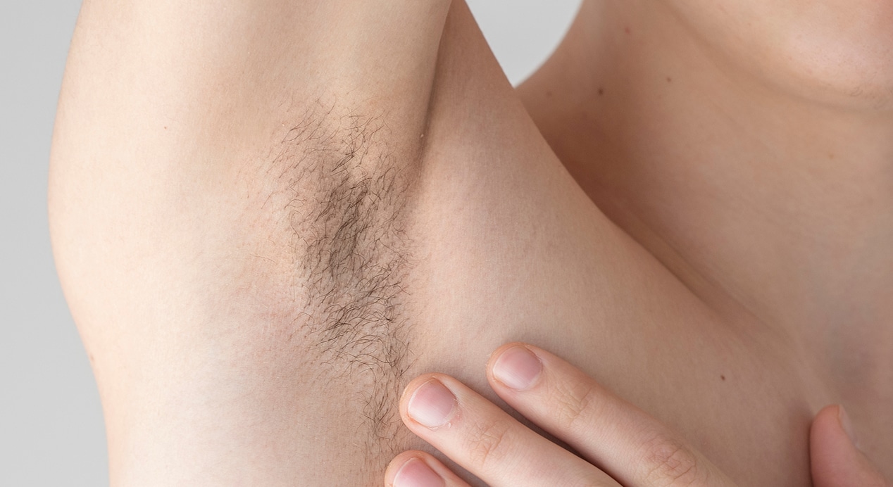 Close up man revealing her armpit 1