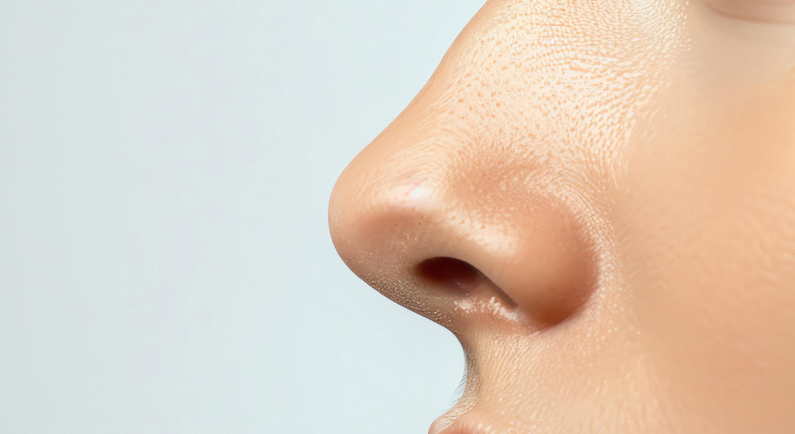 Closeup womans face woman has flawless skin her eyes are looking side 1