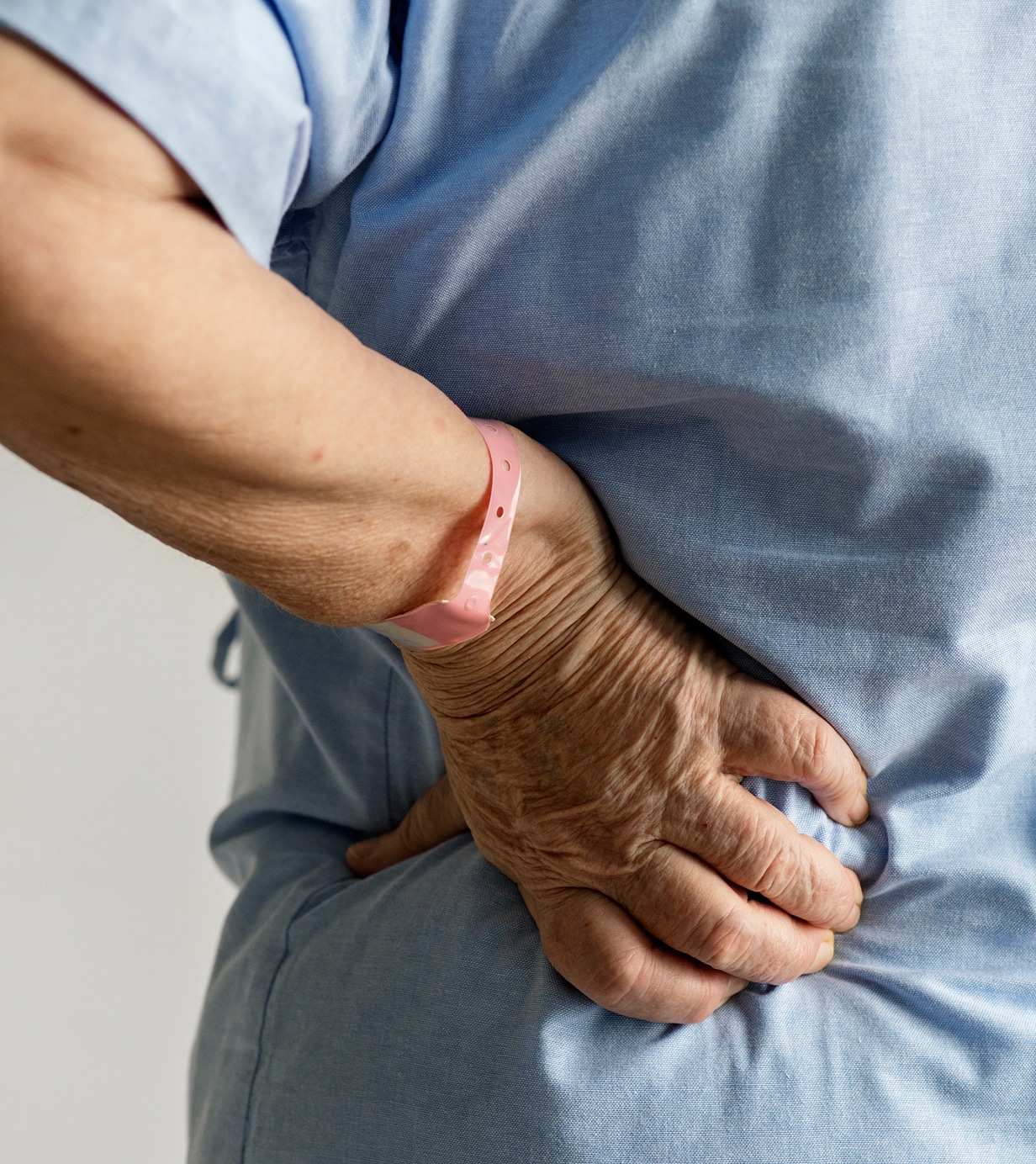 Elderly woman with back pain 1