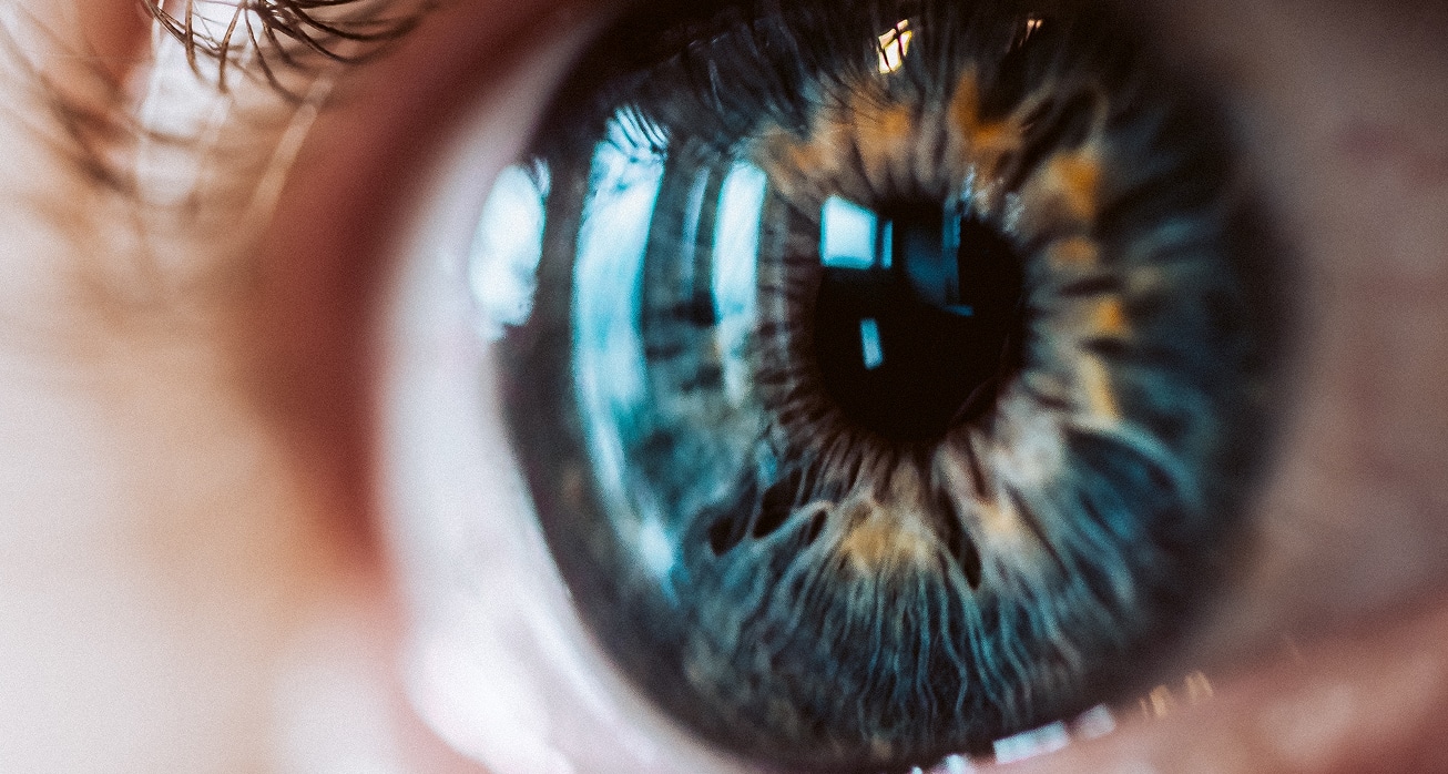 Extreme closeup enlarged human eye with beautiful colors 1
