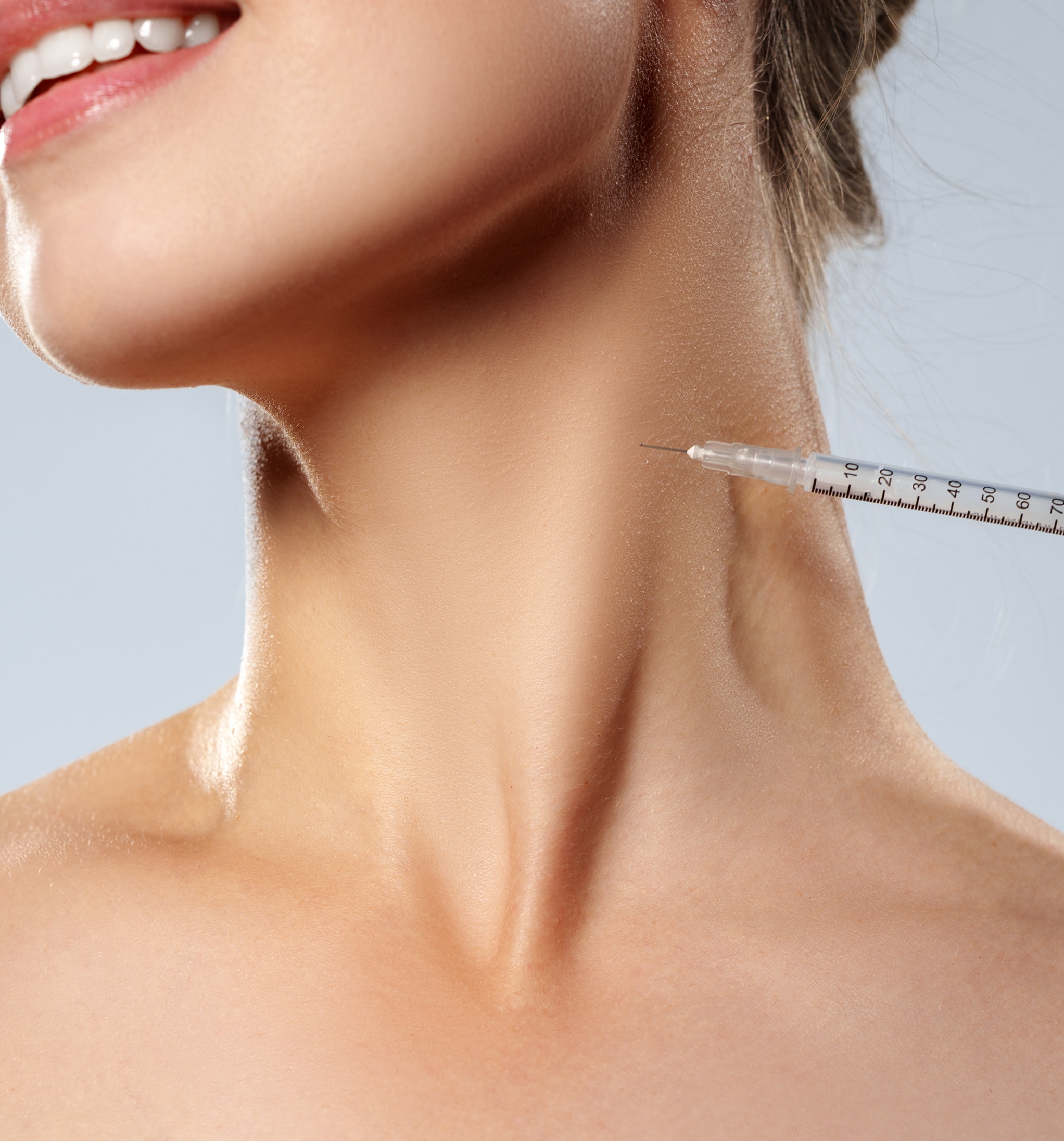 Injection procedure takes place neck woman clinical setting 1 1