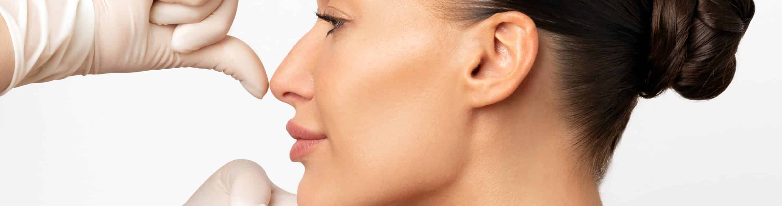 Plastic surgery beauty concept profile shot woman consulting before rhinoplasty operation 1