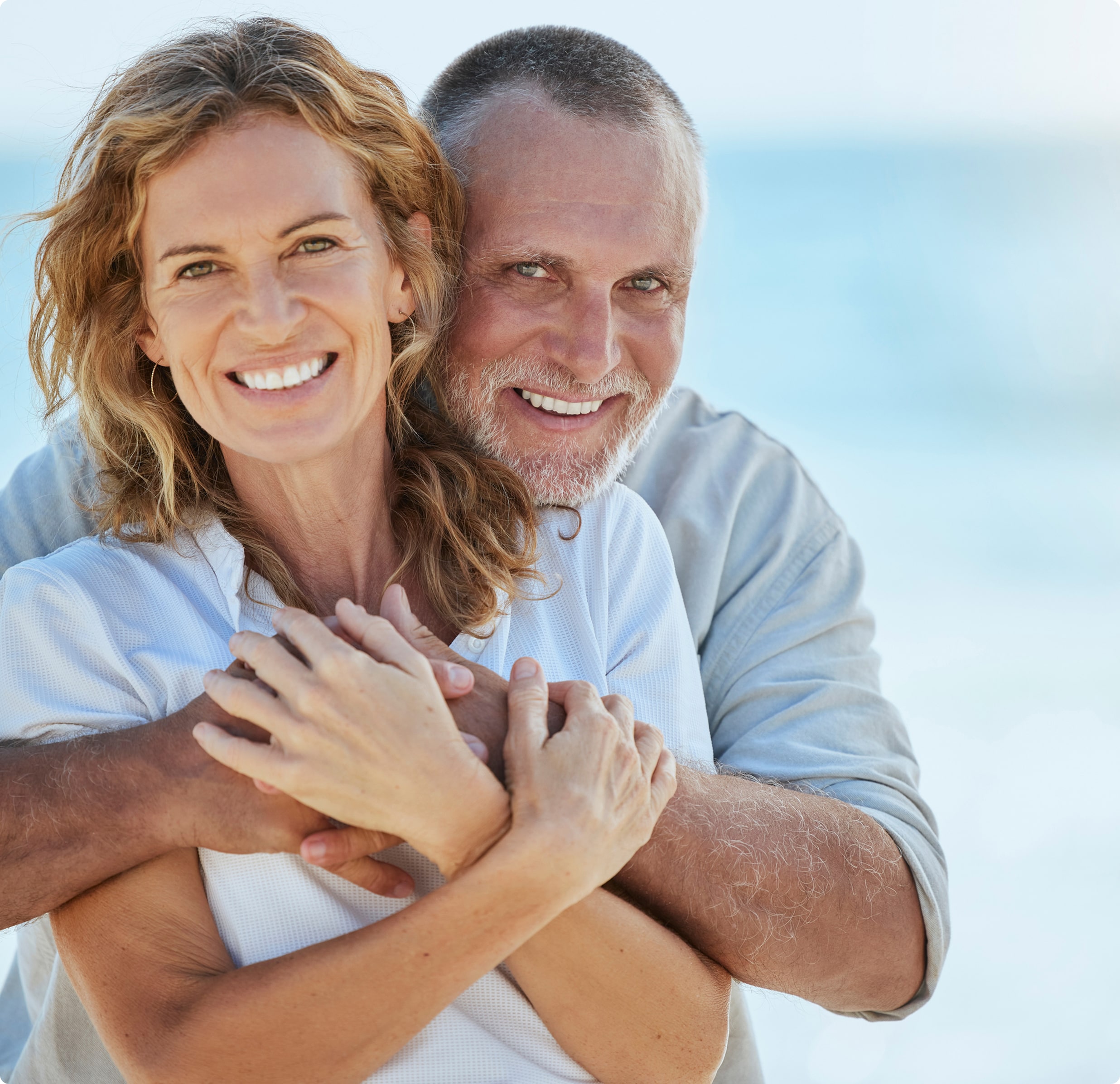 Portrait happy loving retired mature caucasian couple enjoying romantic date beach sunny day cheerful affectionate…