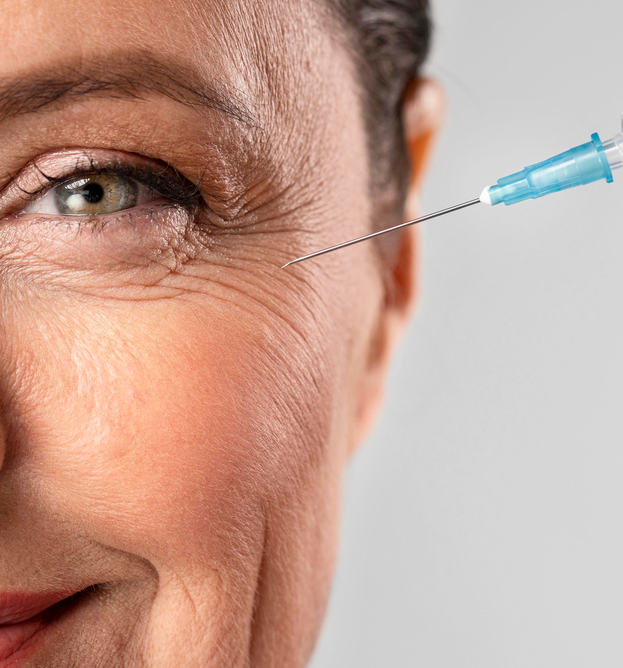 Smiley elder woman using injection her eye wrinkles 1 1