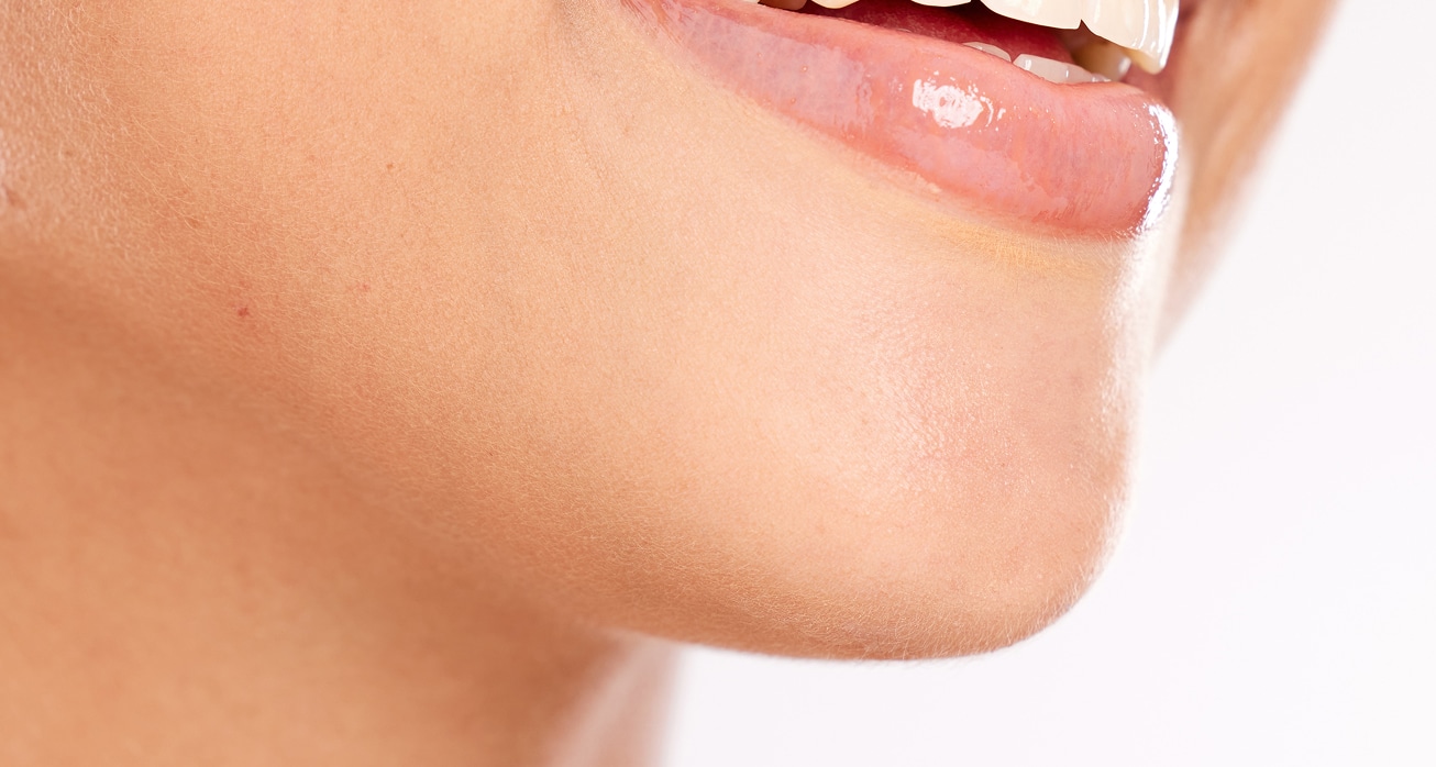Teeth dental care mouth with woman smile healthy gums fresh breath with teeth whitening lips against studio background…