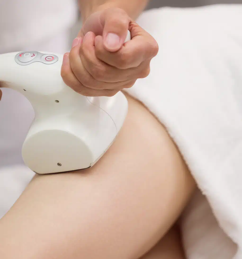 Woman receiving a body-contouring treatment
