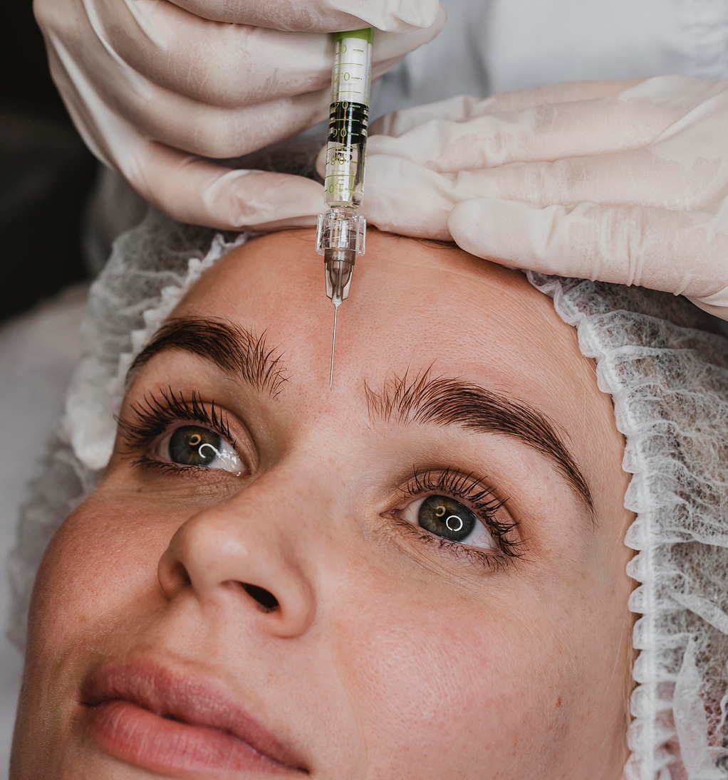 Woman getting facial beauty injection wellness center 1 1