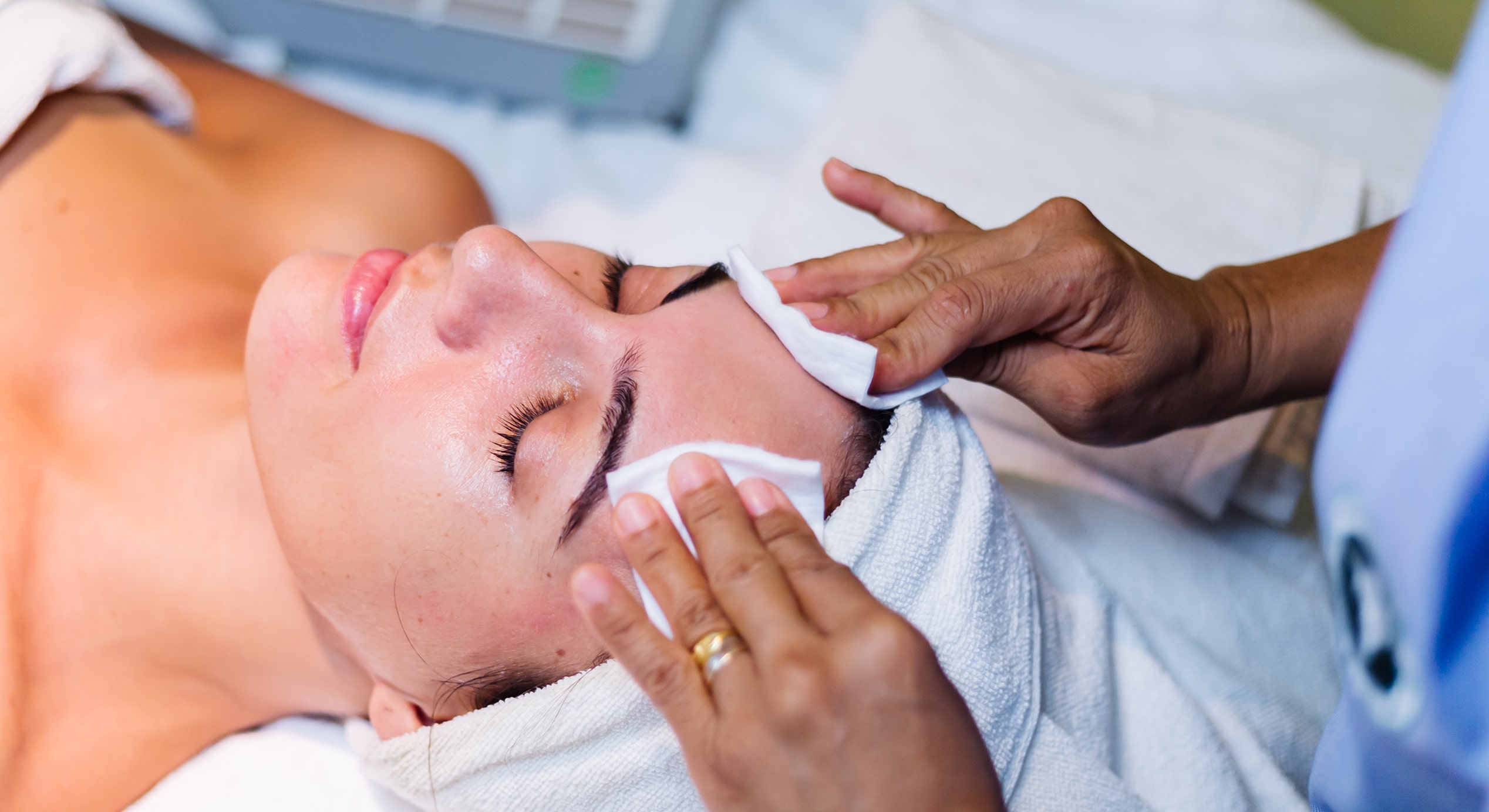 Young woman lying cosmetologist s table rejuvenation procedure 1